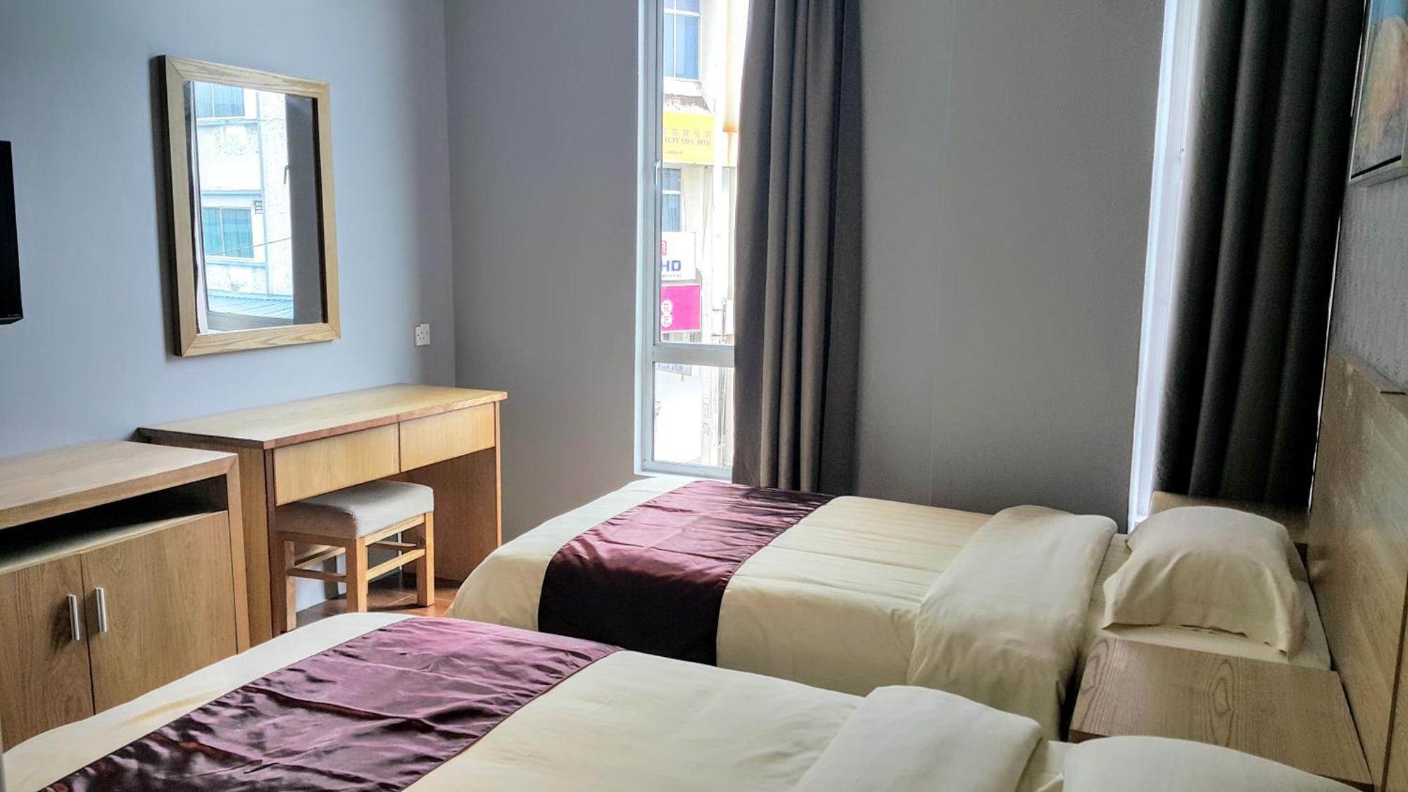 Residence 21 Boutique Inn Miri Szoba fotó